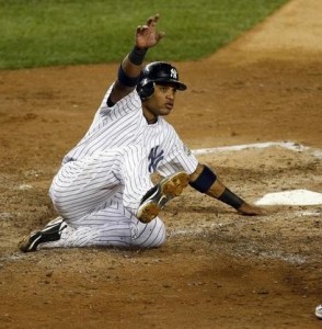 Cano sliding into home