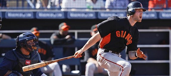 No batting gloves? Gamer. (Lenny Ignelzi/AP)