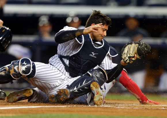 He might be boneheaded sometimes, but maybe Cervelli isn't the worst defender. (Elsa/Getty Images)