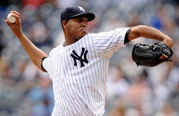 Nova delivers a pitch during his first career complete game shutout. (Maddie Meyer/Getty Images)