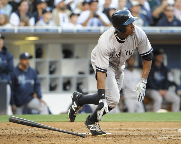 One of the 115 homers Granderson slugged in his four years with the Yanks. (Denis Poroy/Getty Images)