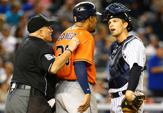 Eric Cooper was behind the plate for that stupid little incident with Carlos Gomez earlier this year. (Presswire)