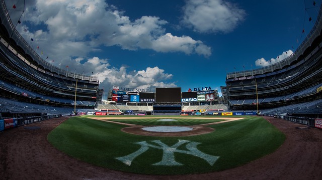 Fans go through metal detectors at Yankee Stadium