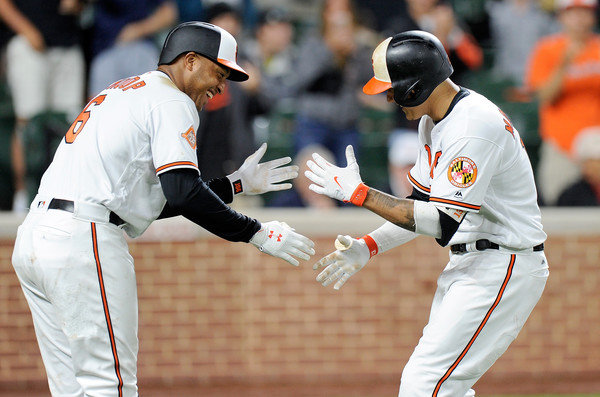 Schoop and Machado. (Greg Fiume/Getty Images)
