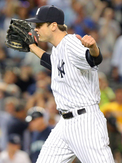 Jul 17, 2015; Bronx, NY, USA; New York Yankees relief pitcher Andrew Miller (48) reacts during the ninth inning against the Seattle Mariners at Yankee Stadium. The Yankees defeated the Mariners 4-3. Mandatory Credit: Brad Penner-USA TODAY Sports
