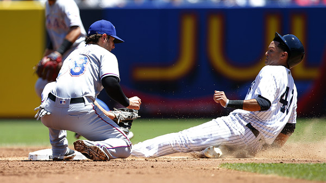 Williams steals a base on Kozma! (Rich Schultz/Getty)